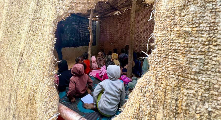 In a Libyan forest, a bare classroom for Sudanese children